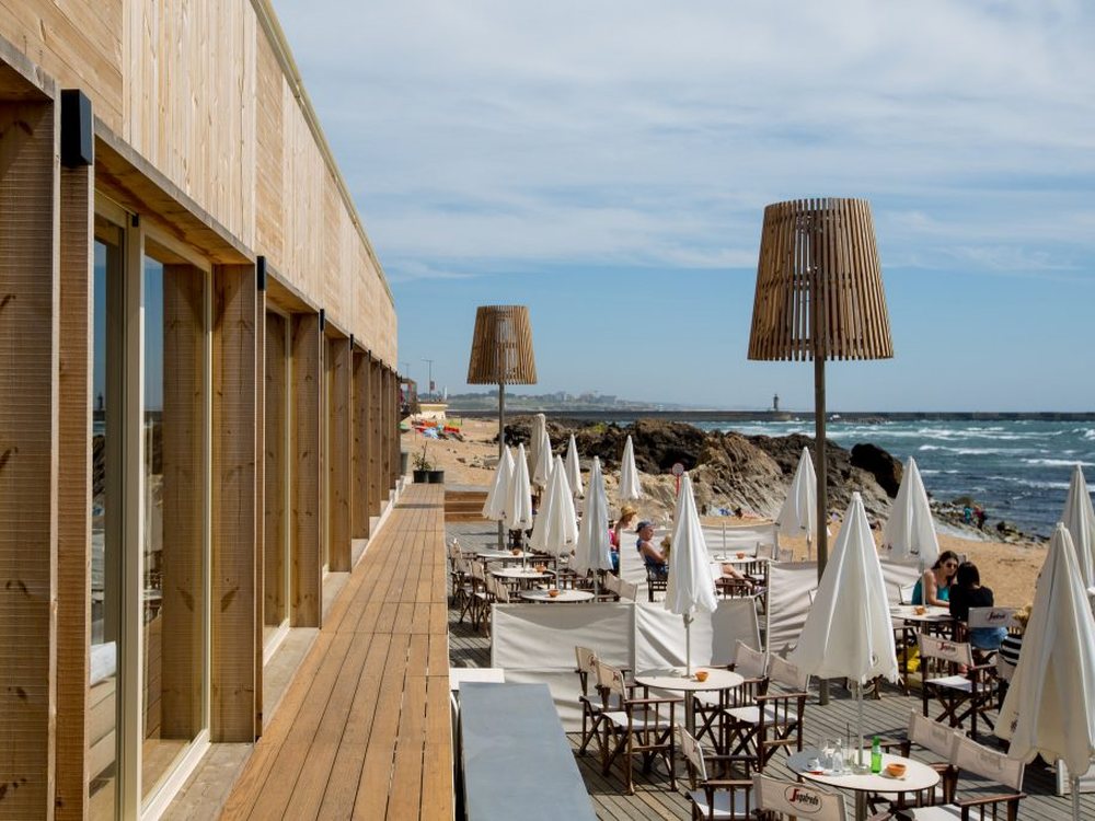 Seafront terrace looking along the beach at Praia da Luz, Algarve