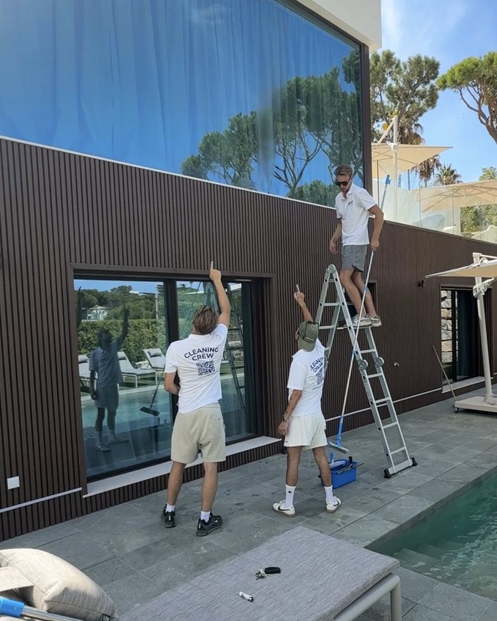 Two of the Algarve Cleaning Crew on the glass at a villa in Vale do Lobo