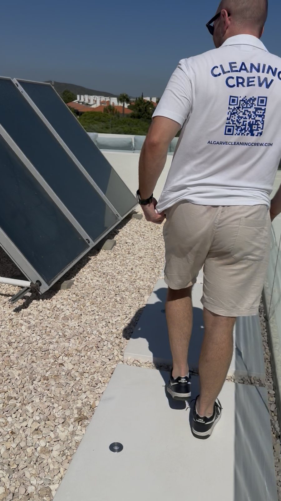 Checking the solar panels on the roof of a villa in Lagoa