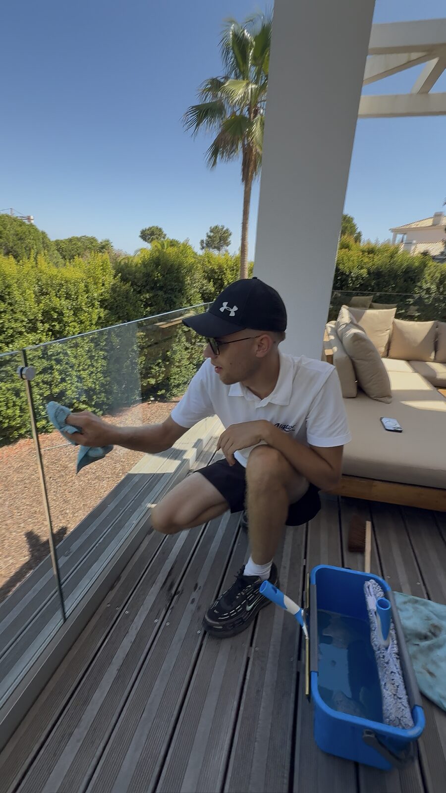 Detailing the edge of a glass balustrade on a terrace at a Quinta do Lago villa