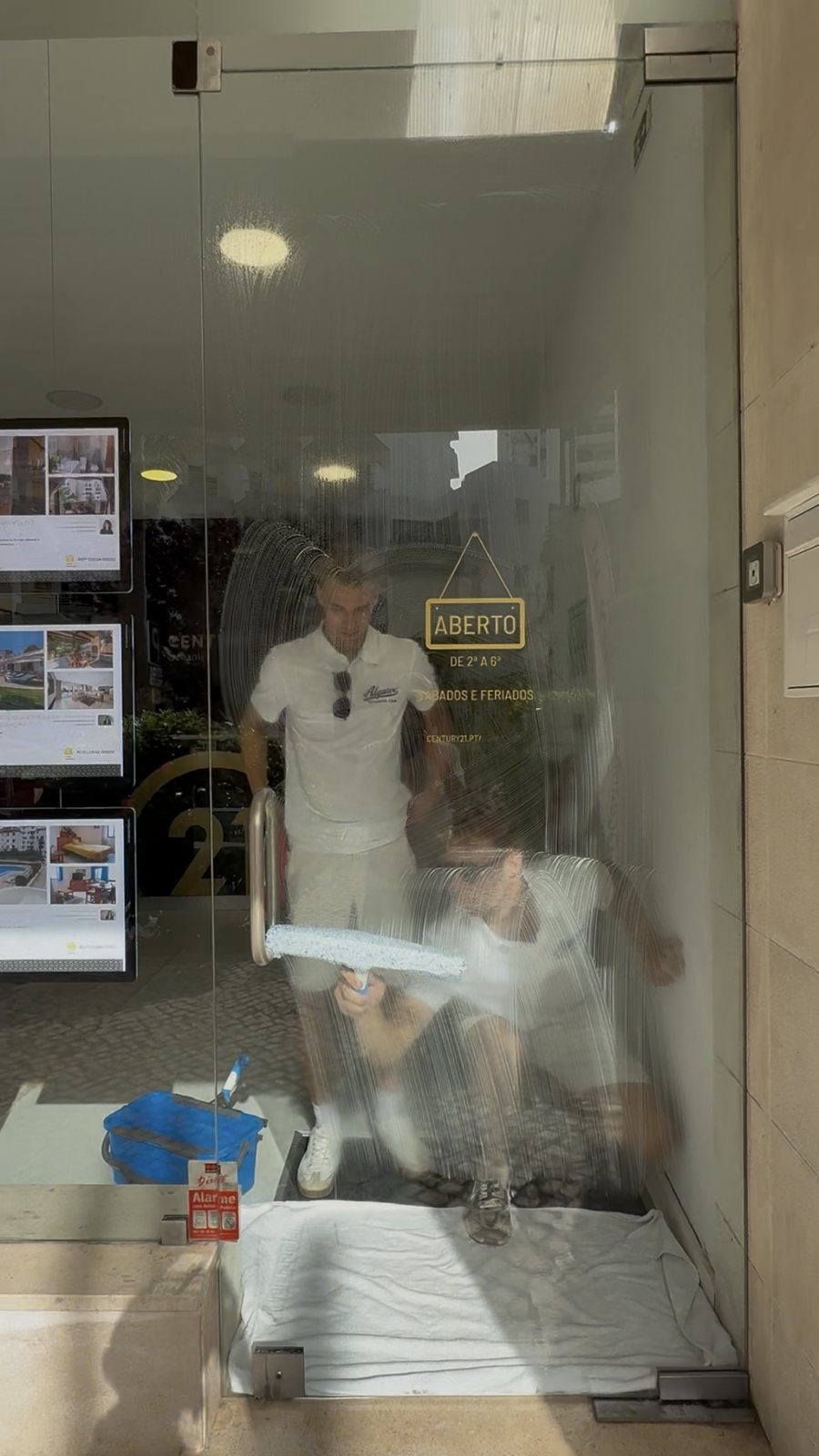 Inside, office open Inside window cleaning at an estate agency on Vilamoura Marina with the office open