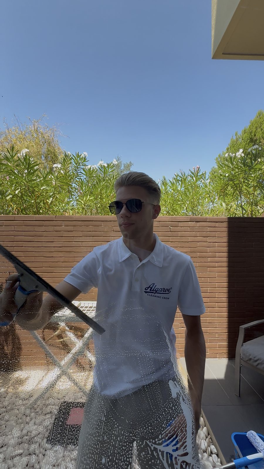 Patio door glass cleaning at an apartment in Vilamoura, Quarteira, Algarve