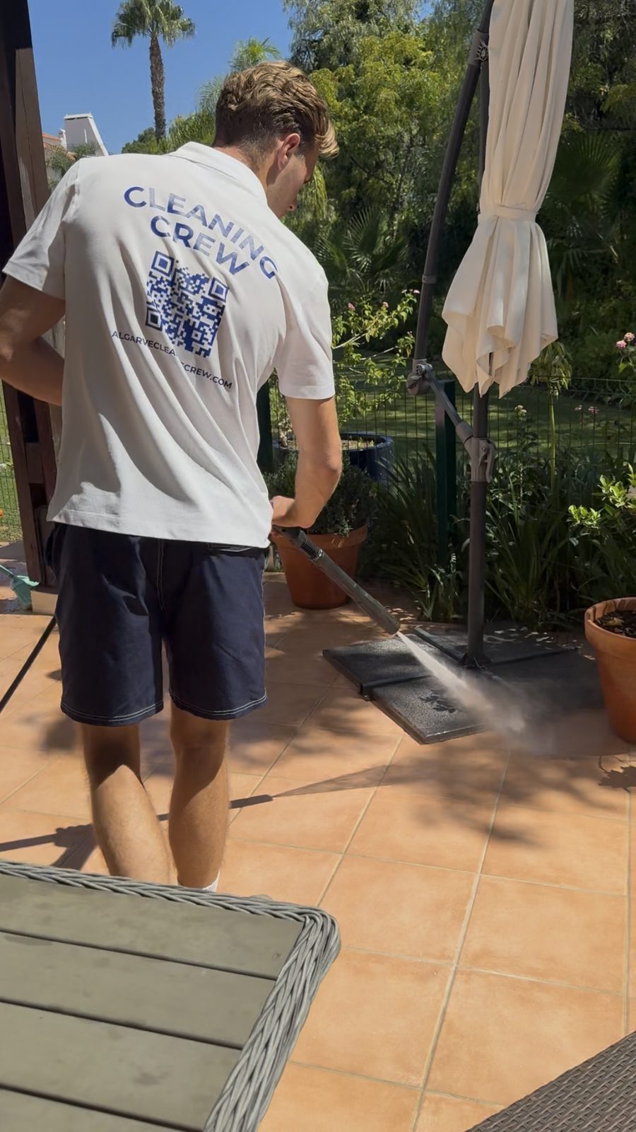 Pressure washing the decking on an apartment terrace in Vilamoura