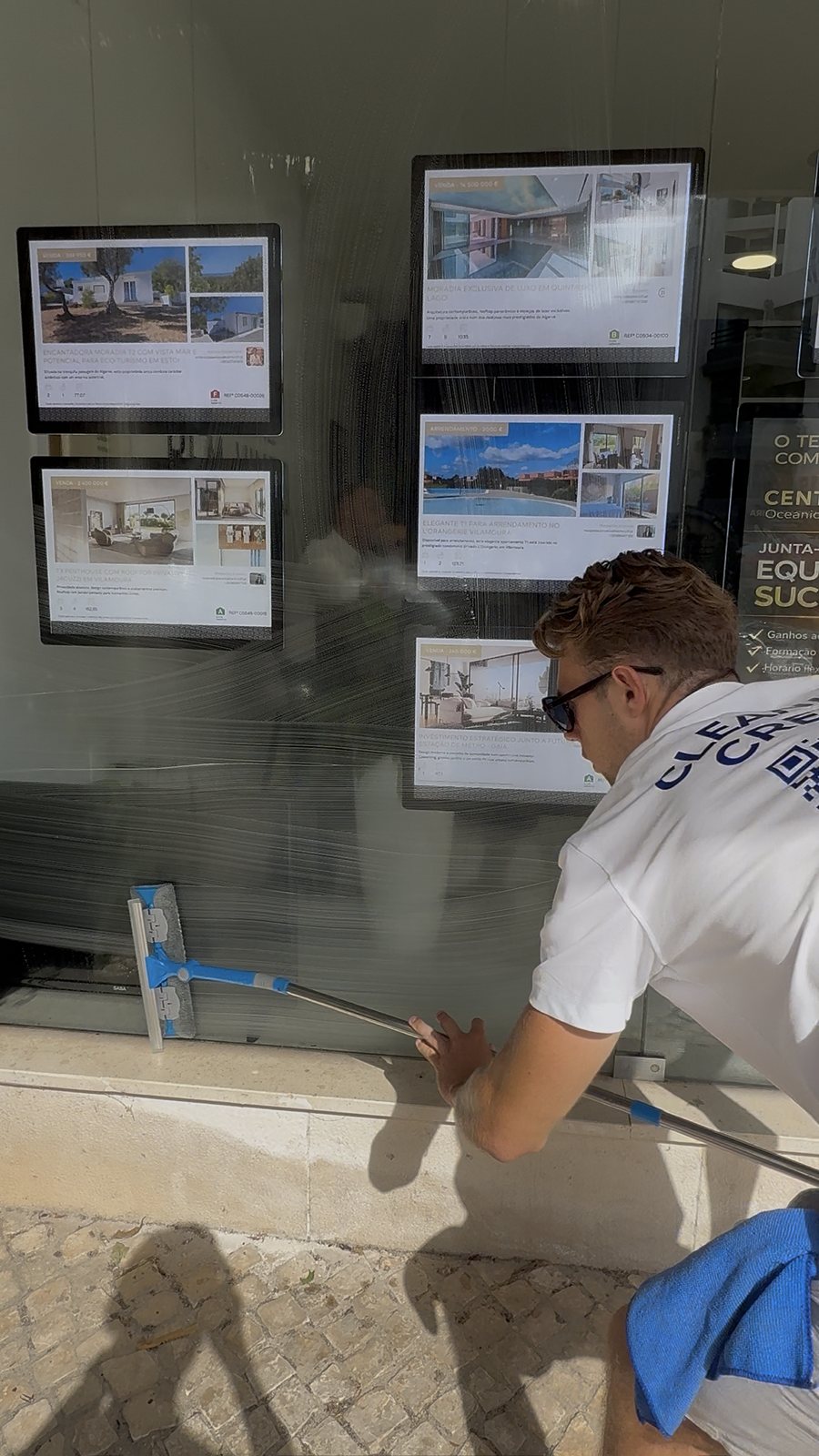 Detail work Detail cleaning of shopfront glass and frames at Vilamoura Marina