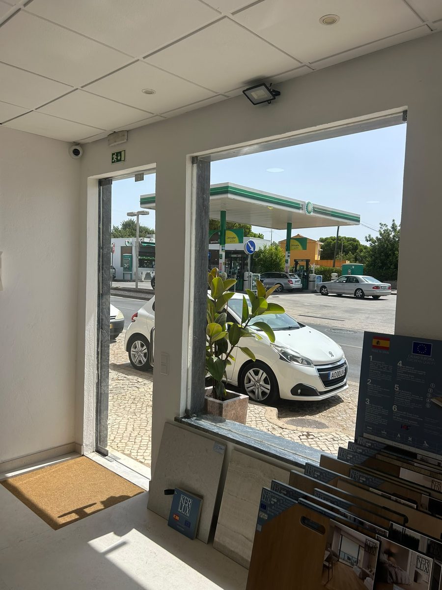 Showroom glazing on the Almancil strip looking out onto the road