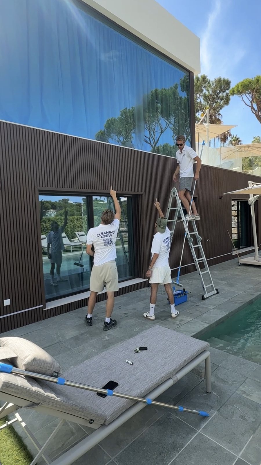 Algarve Cleaning Crew cleaning the glass elevation of a villa in Vale do Lobo